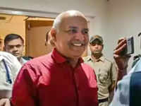 <i class="tbold">manish sisodia</i>