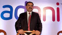 <i class="tbold">gautam adani</i>