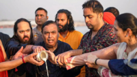 <i class="tbold">Mukesh Ambani</i> with family