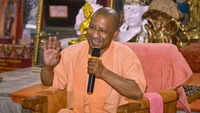 <i class="tbold">yogi adityanath</i>