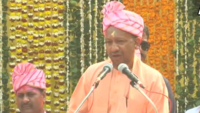 <i class="tbold">yogi adityanath</i>