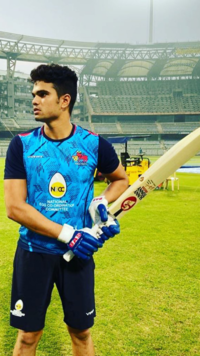 <i class="tbold">arjun tendulkar</i>