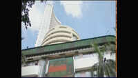 Sensex continues to trade in red, Nifty slumps below 11000
