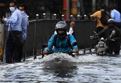 Mumbai rains live updates: Heavy rains, waterlogging throw normal life out of gear; suburban train services resume partially