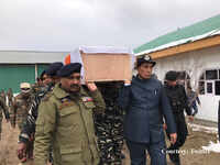 Rajnath Singh carries coffin of slain CRPF soldier killed in Pulwama attack