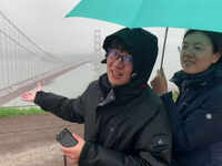 California storm deters traffic, but not tourists
