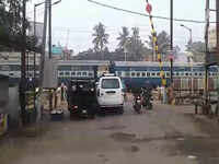 Watch: Train passes while level crossing gates opened in Odisha