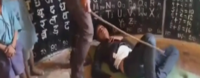 Drunk teacher caught sleeping in class, beaten up by students