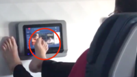 Netizens fume over man captured using airline touchscreen with his bare-feet
