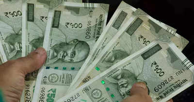 Rupee Falls Paise To Close At Against Us Dollar Times Of India