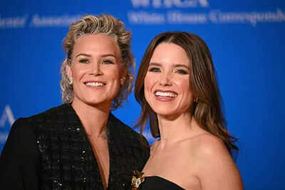 Sophia Bush responds to online engagement rumors by flashing bare fingers