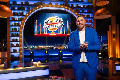 Travis Kelce showcases his musical expertise in a clip of Are You Smarter Than a Celebrity featuring Lilly Singh