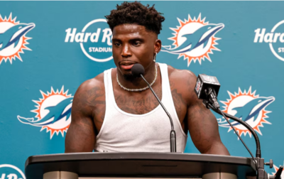 Cam Newton Calls Out Tyreek Hill Over "Dawgs" Comment—Dolphins Stars Weigh In