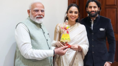 Sobhita Dhulipala and Naga Chaitanya meet PM Modi; present a book on ANR and gift a Kondapalli doll