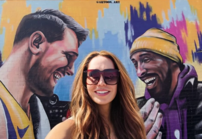 Mirjam Poterbin Smiles in Selfie in Front of New Mural Paying Tribute to Luka Doncic and Kobe Bryant