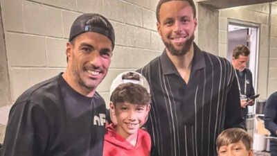 Former Barcelona star Luis Suarez meets NBA legend Stephen Curry during Golden State Warriors vs Miami Heat game in Florida