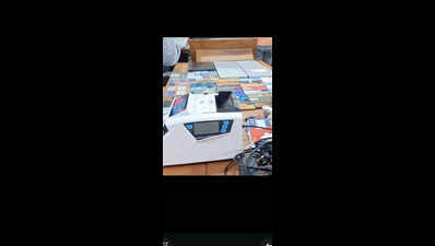 9 held for duping people through fake trading app