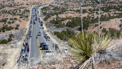 Thousands of pilgrims trek through New Mexico desert to historic adobe church for Good Friday