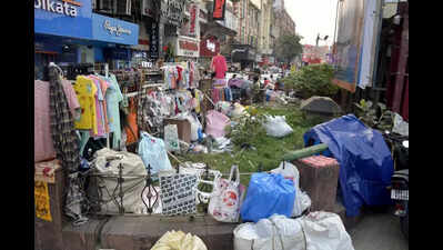 Hawkers’ display counters: Bikes, car bonnets, lamp posts, cables, railings