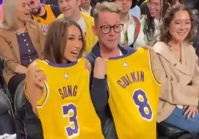 Home Alone star Macaulay Culkin and Brenda Song receive custom team jerseys at Los Angeles Lakers–Minnesota Timberwolves showdown