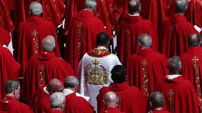 Who is Cardinal George Jacob Koovakad, the priest adorning a white cloak at Pope Francis' funeral?