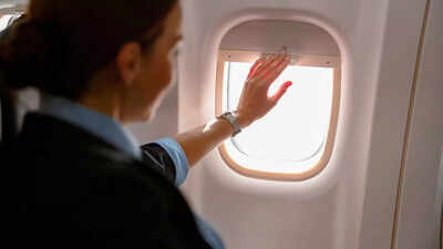 Why do flight attendants insist on opening window shades before takeoff and landing