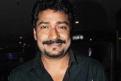 Cinematographer Madhu Ambatt at the preview of Reji Nair’s Kalikaalam in Kochi