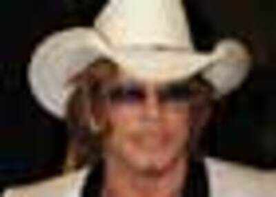 After split, Rourke finally moves on