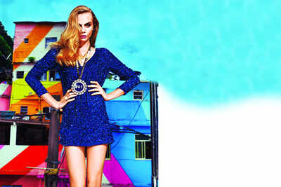 Cara Delevingne goes from model to mermaid