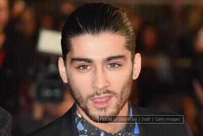Zayn Malik debuts new lotus flower tattoo