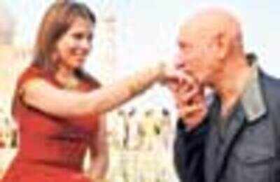 Kingsley romances wife in Taj's lawns