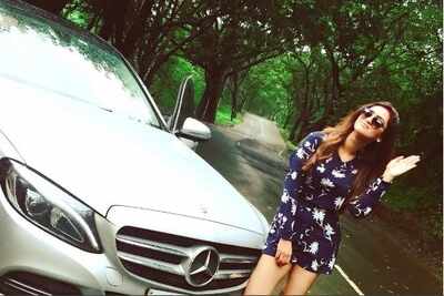 Krystle D'Souza's royal wave in front of her luxury car, see pic