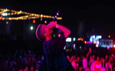 Jaden Smith waves the Indian flag on stage during his debut Indian performance