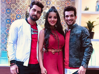 Photo: Monalisa strikes a pose with husband Vikrant Singh Rajput and friends