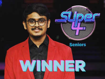 Super 4 winner: Abhijith Anilkumar from Vidhu Prathap's team lifts the trophy