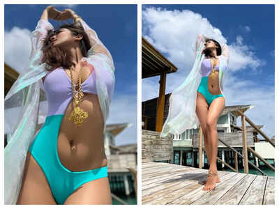 Pics: Malavika Mohanan sets the internet on fire in a monokini