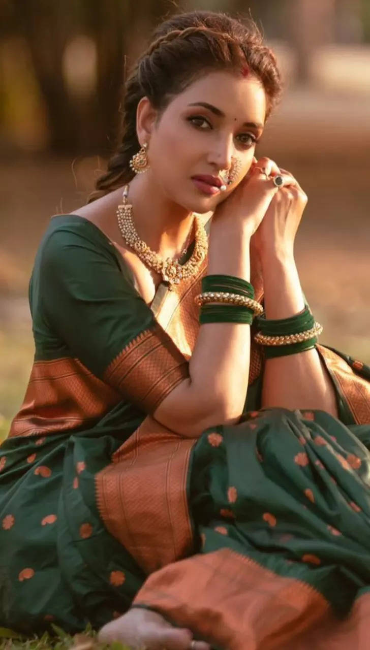 Image of Indian traditional Beautiful Woman Wearing an traditional Saree  And Posing On The Outdoor With a Smile Face-FI250192-Picxy