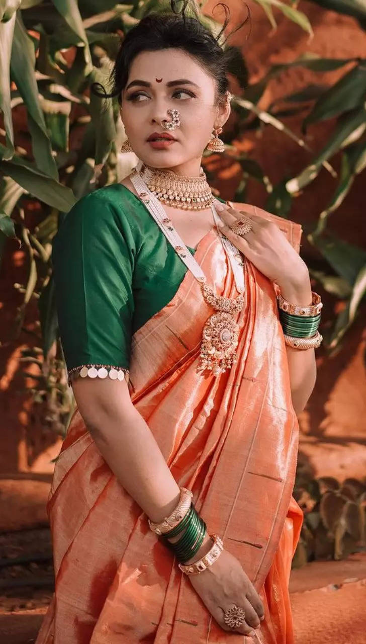 Premium Photo | Beautiful indian young girl in traditional saree posing  outdoors
