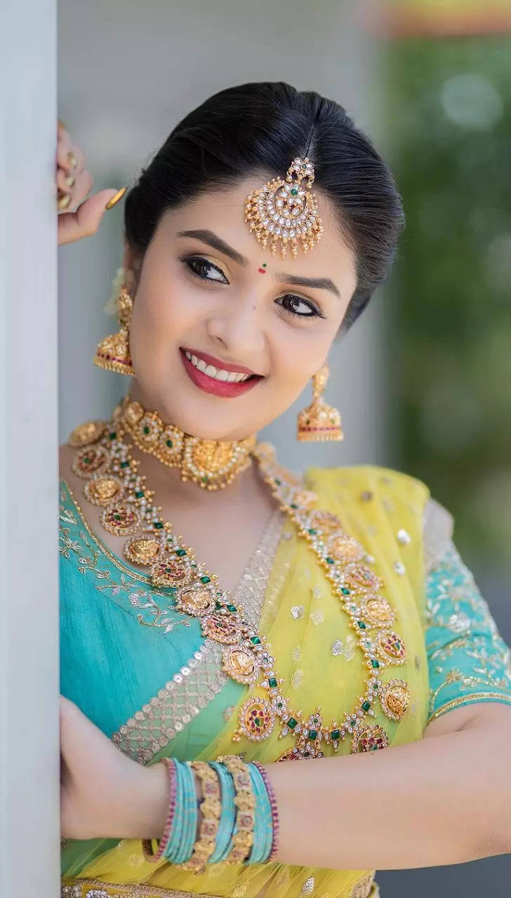 a woman in traditional indian attire poses for a photo with her  bridesmaids. AI-Generated 32558989 Stock Photo at Vecteezy