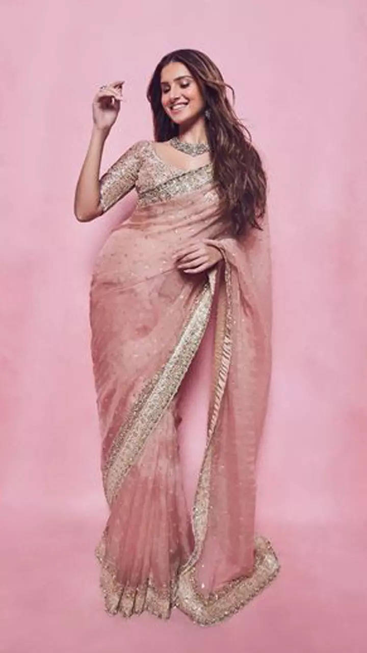 Tara Sutaria exudes wedding fashion inspiration in a pink saree