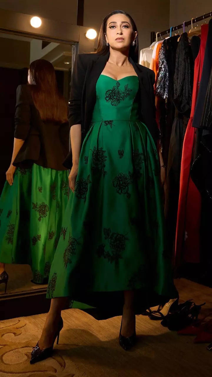 Karisma Kapoor's look in emerald green dress with black blazer is