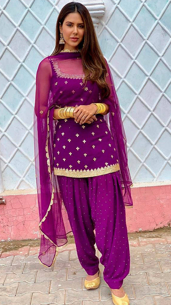 sonam bajwa purple suit