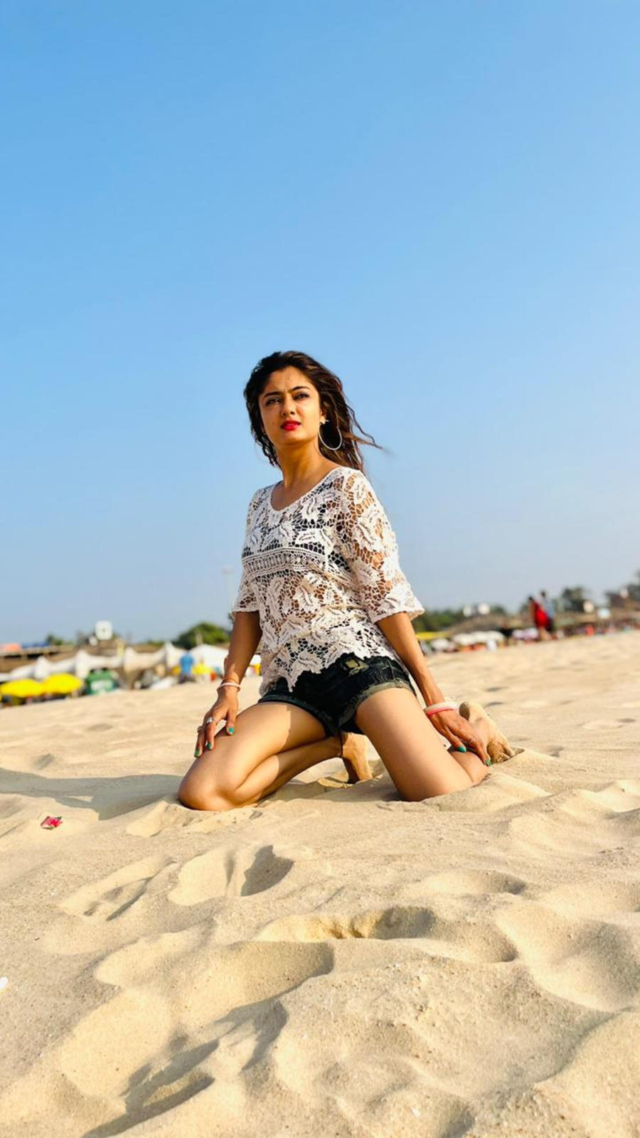 Alluring Poses Of Neha Sharma From Goa Beach