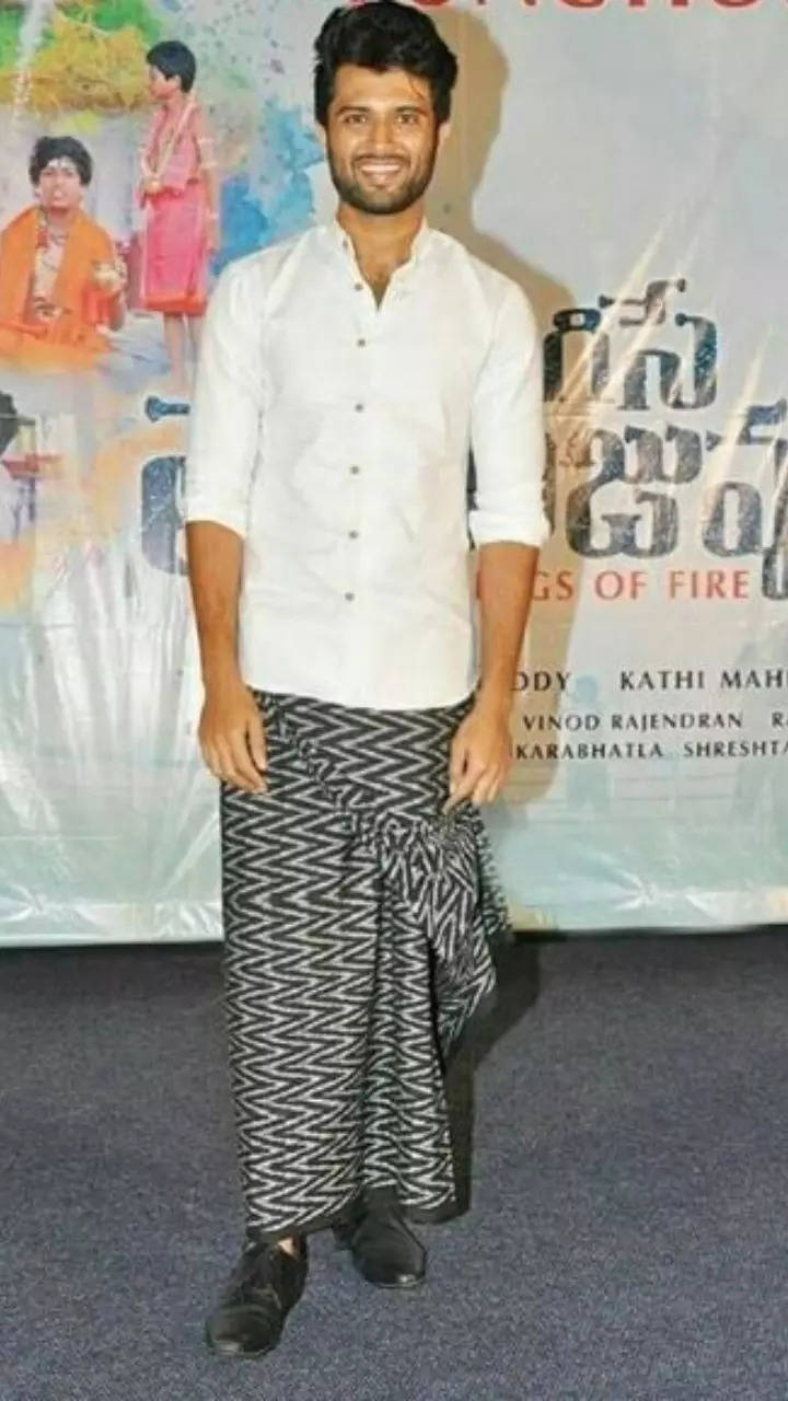 black shirt white lungi