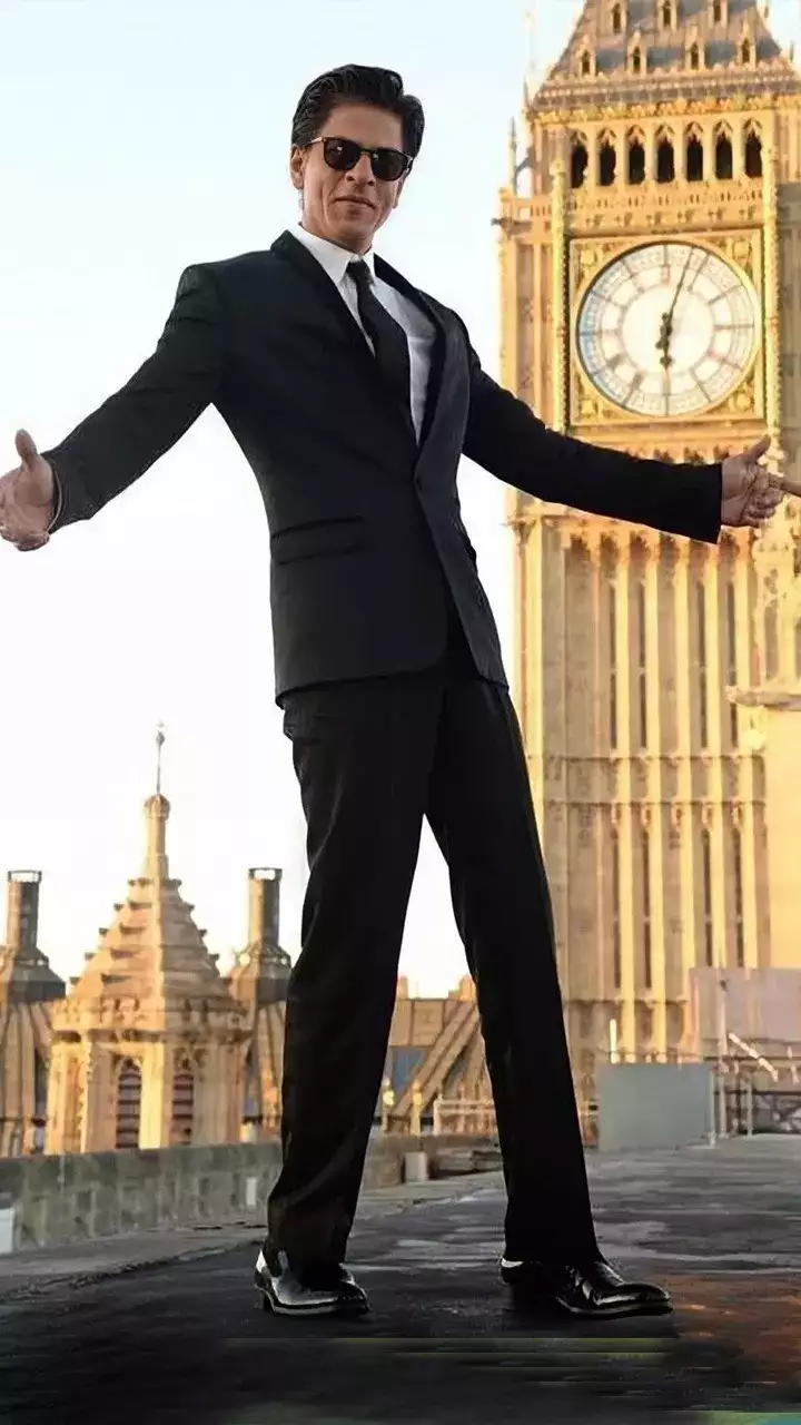 Shahrukh Khan pose with open arms | AI Emoji Generator