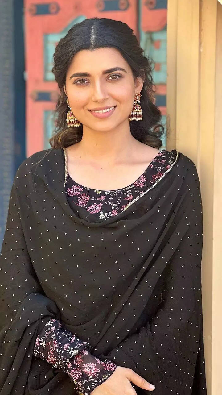 nimrat khaira black suit