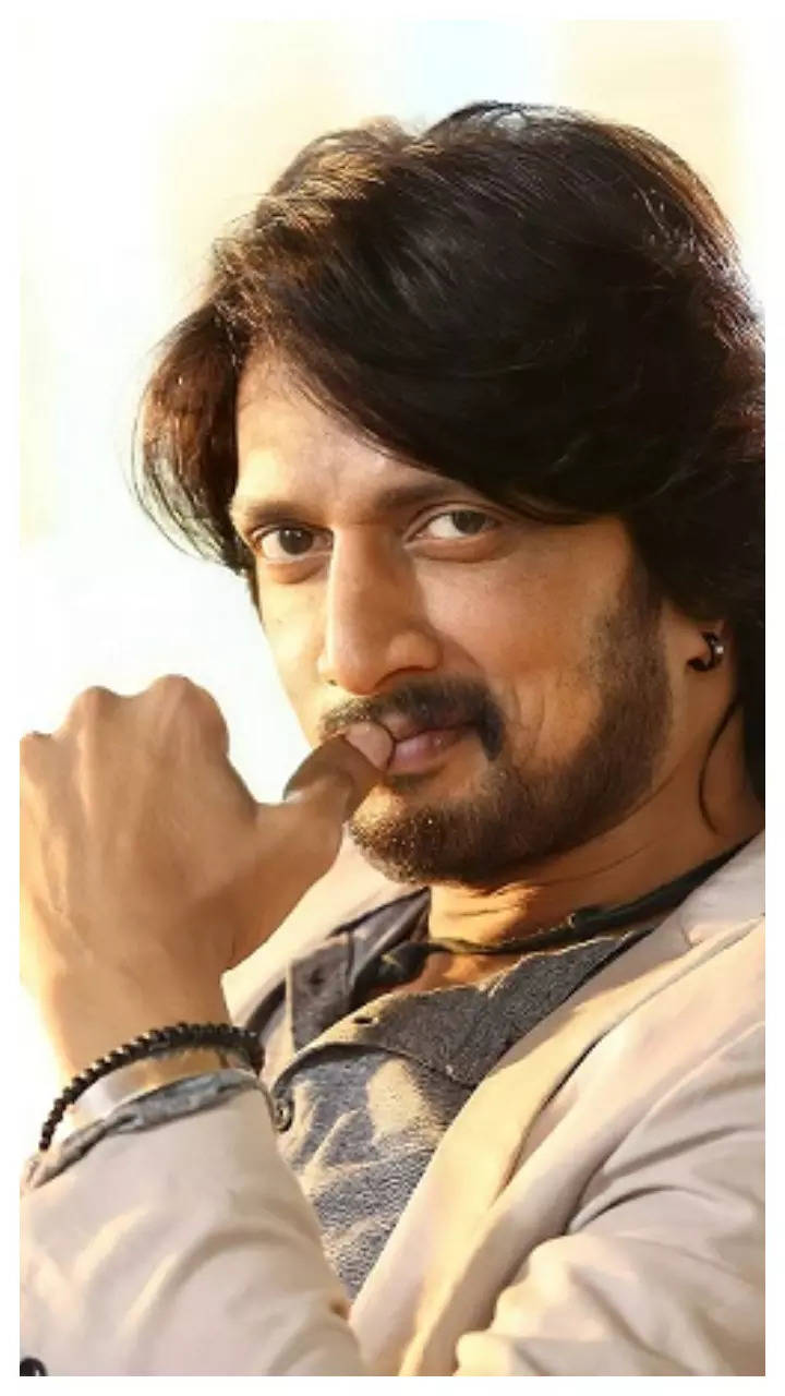 Download Sudeep In Black Leather Jacket Wallpaper | Wallpapers.com