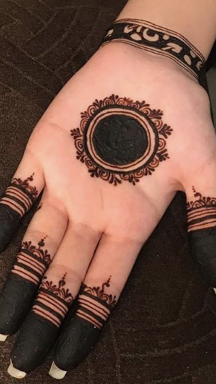 Woman Hand With Black Henna Tattoo On Jewelry, Indian Bride Girl Hand With  Black Mehndi Tattoo Stock Photo, Picture and Royalty Free Image. Image  146691596.