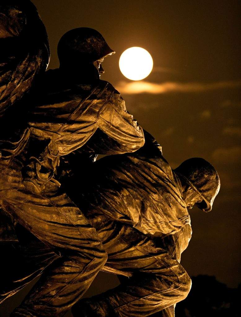A supermoon rises above the US Marine Corps War Memorial. (Win McNamee/Getty Images/AFP) 