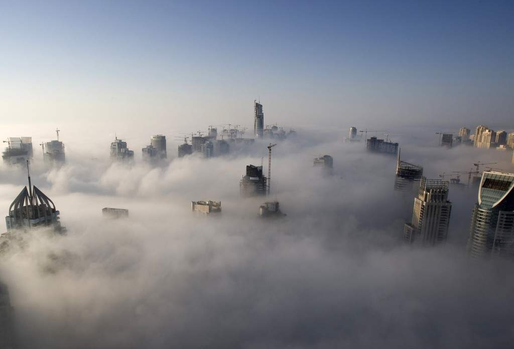 Heavy fog rolls by early in the morning near the Dubai Marina. (REUTERS/Steve Crisp)